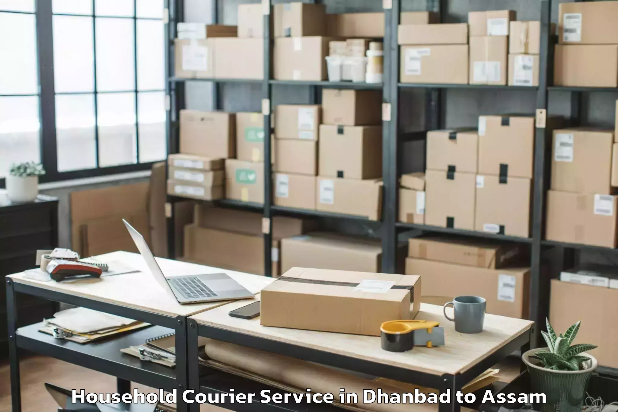 Top Dhanbad to Barpeta Road Household Courier Available